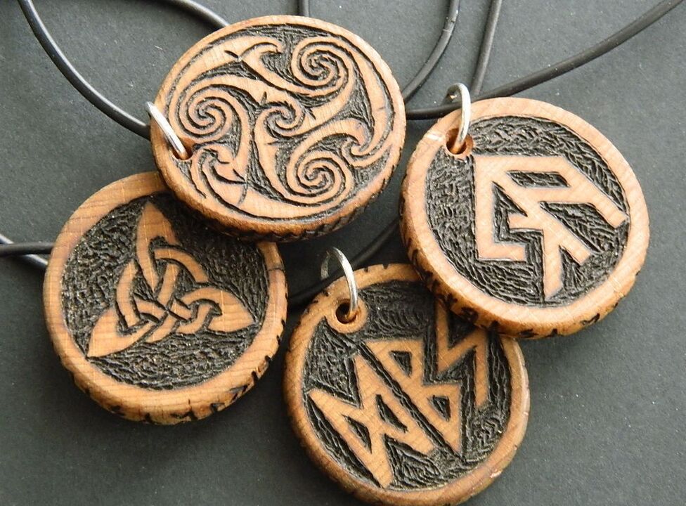 Pendant with runes as a lucky charm